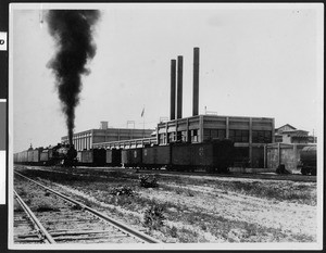 Freight cars near the power plant for the Santa Fe Railway ice plant, Yard "B", San Bernardino, CA, ca.1930