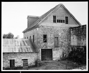 Exterior view of the Stanislaus Flour Mill in Knight's Ferry, ca.1930