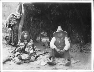 "Walapai Bill", a renegade living with the Havasupai Indians and his Havasupai wife, Ta-va-su-ja, a basket maker, ca.1900