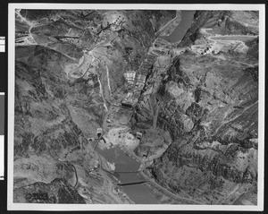 Construction of Boulder Dam, showing the mountains on either side, March 17, 1934