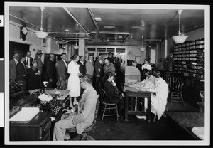 Interior view of outpatient registration in the basement of the Administration Building of the Los Angeles County General Hospital, ca.1925