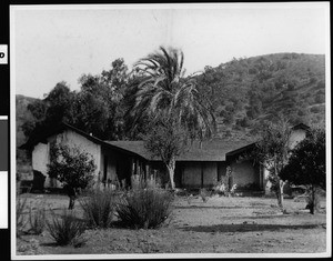 Exterior view of the barn outbuildings used for sheep ranching at the Rancho Monseratta two miles up San Luis Rey Valley, 1870-1880