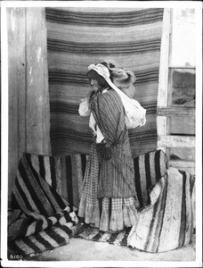 Young Walapai Indian woman with a pack on her back, Hackbury, Arizona, ca.1900