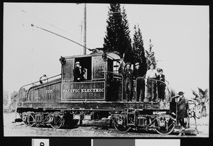 Men posing on a Pacific Electric railway car, ca.1906