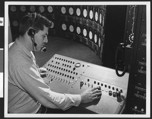 A close-up view of an electronic console, which controls large rocket engine test firings at Rocketdyne's Propulsion Field Laboratory, ca.1958