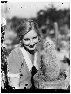 Woman next to a cactus in the Natural History Museum