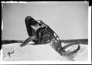 Destroyed British-made Mark IV tank with German insignia, ca.1919