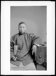 Chinese doctor with long finger nails, ca.1895-1920