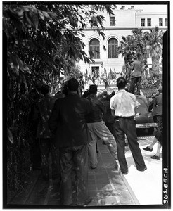 Men filming the dedication of Simon Bolivar Plaza on Pan American Day, Los Angeles