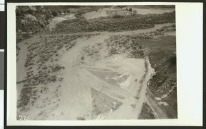 Aerial view of flooding of a railroad bridge (A.T. & S.F.R.R.) and Mountain View east of Colton, ca.1930