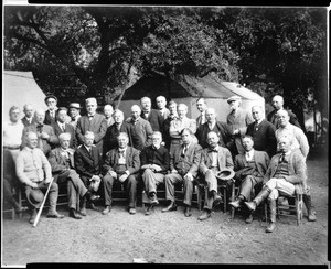 Group portrait of Sunset Club members in camp, ca.1905