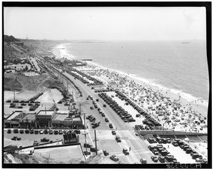 Birdseye view of a crowded beach near Pacific Coast Highway in Santa Monica, ca.1930