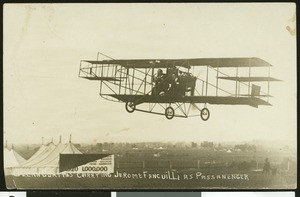 Glenn Curtis carrying Jerome Fancuilli as passenger at the Dominguez Air Show, 1910