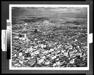 Aerial view of Los Angeles, looking northeast over City Hall, ca.1960