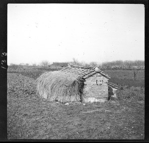 Exterior view of a storehouse on a farm in China, ca.1900