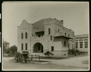 Exterior view of the County Jail in Riverside, with buggy parked in front, ca.1910