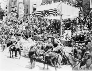 Los Angeles' La Fiesta on Broadway Street, with former U.S. President McKinley leaving in a carriage in front of City Hall, 1901