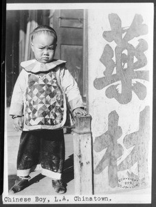 Small Chinese boy in traditional clothing, Chinatown, Los Angeles, ca.1888-1935