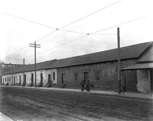 External view of an adobe home formerly known as the Ybarra home, 730 and 750 North Spring Street, Los Angeles, ca.1895