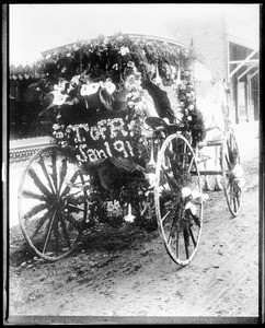 Rear quarter view of a horse-drawn float in the Pasadena Tournament of Roses Parade, January 1, 1891