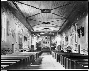 Interior view of Mission Santa Clara de Asis, looking towards the altar, ca.1890