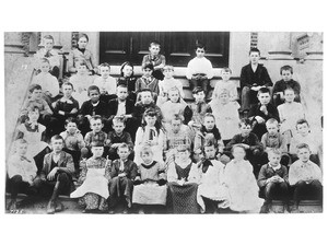 Portrait of pupils on the steps of the Spring Street School, Los Angeles, ca.1890