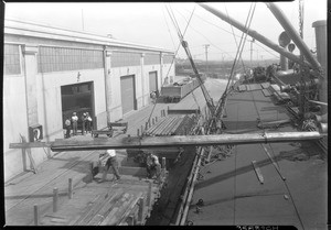 Steel being unloaded from the steamship Calmar at Los Angeles Harbor, October 4, 1937