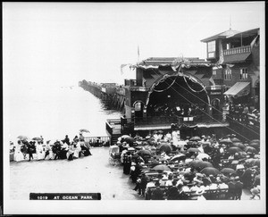 Harry Moore's band playing in front of a crowd on the Ocean Park bandstand, 1900-1910