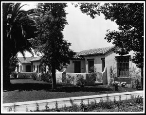 Exterior view of a row of Spanish Revival-style houses