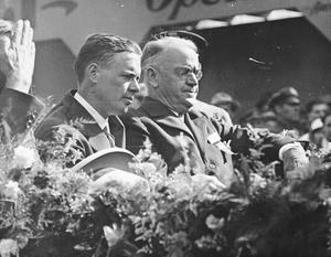 Charles Lindbergh in an open car in a parade, ca.1927