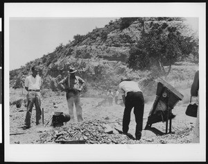 Men using equipment to examine crushed bedrock, ca.1907