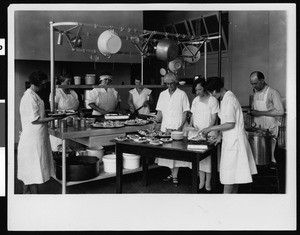 Students of all ages in a cooking class at the Frank Wiggins Trade School, ca.1920-1929