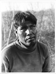 Portrait of a Yuma Indian man wearing a turtleneck sweater, ca.1900