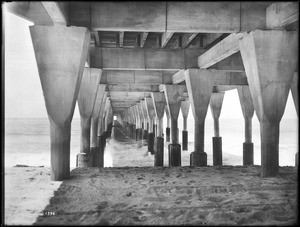 View of the concrete piles (columns) under the Santa Monica pier, ca.1915