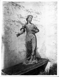 Statue of the virgin and martyr Santa Inez (Saint Agnes) at Mission Santa Inez, ca.1906