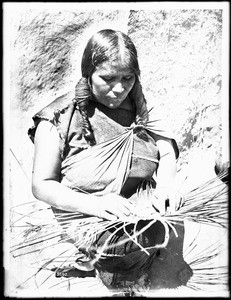 Hopi Indian woman basket maker, ca.1900