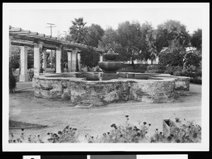 Garden and fountain at the Mission San Fernando, ca.1900