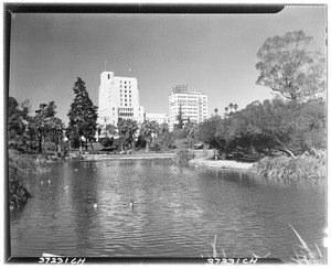 View across the lake at MacArthur Park, showing the Elk's Club in the background