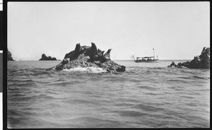 Fishing boat and seals, ca.1910