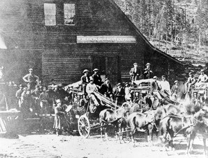 Portrait of coachmen in front of the Wells Fargo Express and Stage Line depot, Cisco, ca.1880