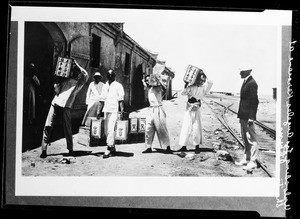 Workers unloading Los Angeles kerosene in Shantung, China