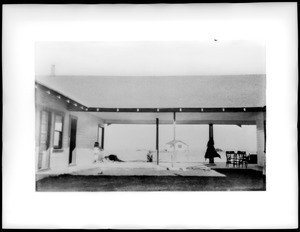 View of a patio built as a breezeway on a house in the desert, ca.1900-1930