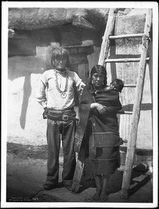 Hopi Governor and his wife, in the village of Shonguapavi, ca.1901