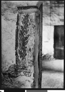 Palm decoration inside of door in cloister room, Mission San Fernando