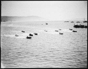 Large group of motorboats racing down the water at the Los Angeles Harbor, ca.1928