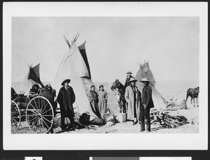 Sioux Indians visiting the tents to persuade others to war council, ca.1891