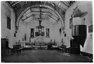 Mission San Antonio de Padua, California. Interior view showing original altar and pulpit, 1891