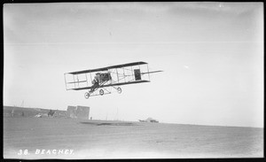 Aviator Lincoln Beachey in the air over Dominguez Field at the Air Meet, 1912