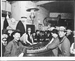 View of a craps game inside a western saloon, ca.1890-1910