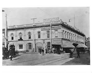 Exterior view of Downey Block on the corner of Spring Street and Temple Street, ca.1905